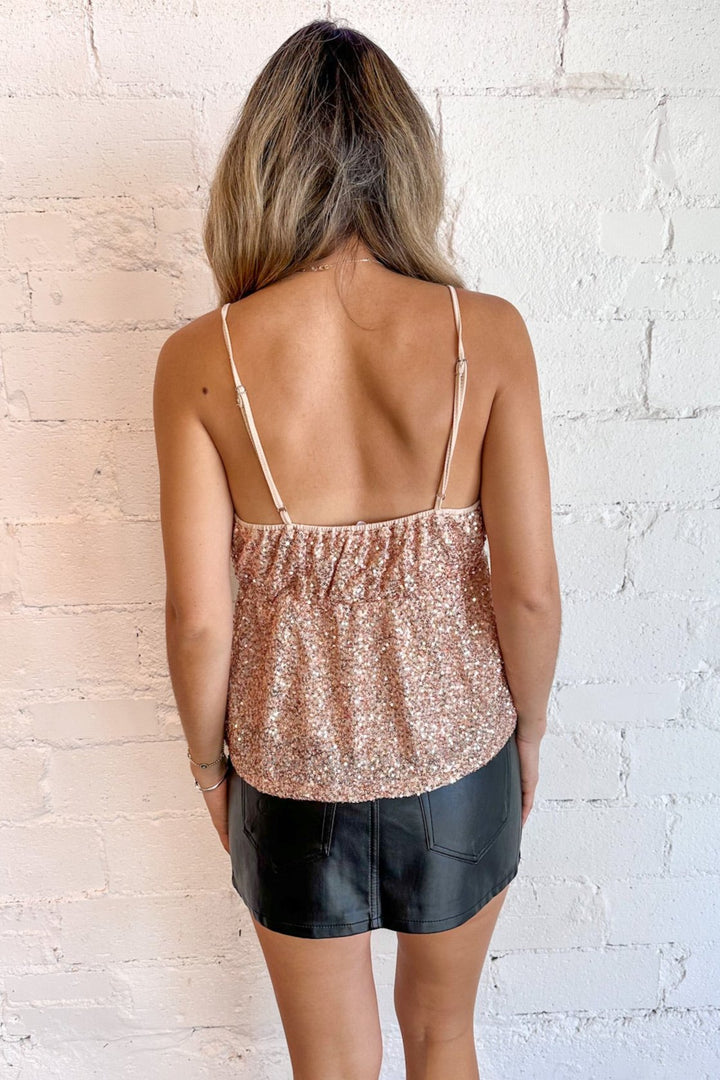 Delicate shimmer for a radiant, eye-catching look
Soft, flowing fabric for a comfortable fit
Elegant champagne color for versatile styling
Perfect for both casual outings and special events
