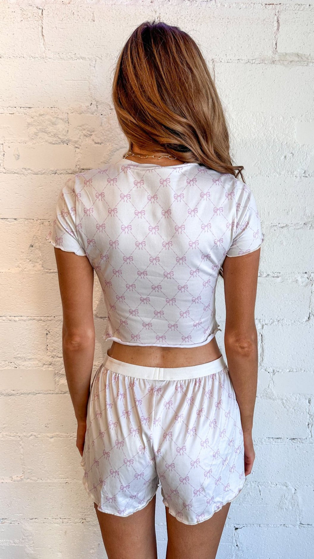 Soft, lightweight fabric for ultimate comfort
Adorable bow detail at the waistband
Relaxed fit perfect for lounging or sleeping
Pretty pink color for a feminine touch