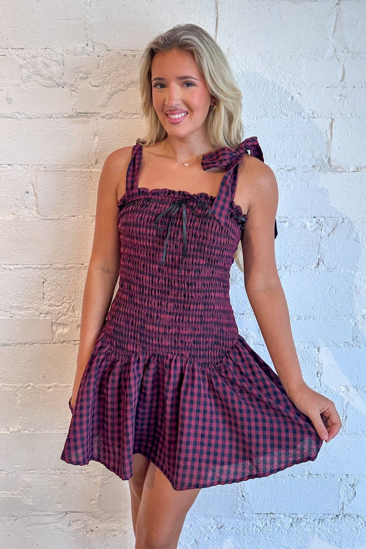 Timeless gingham pattern
Flattering fit-and-flare design
Lightweight, breathable fabric
Perfect for any occasion, dallas boutique, womens boutique dallas, gingham dress, smocked dress, gameday dress 