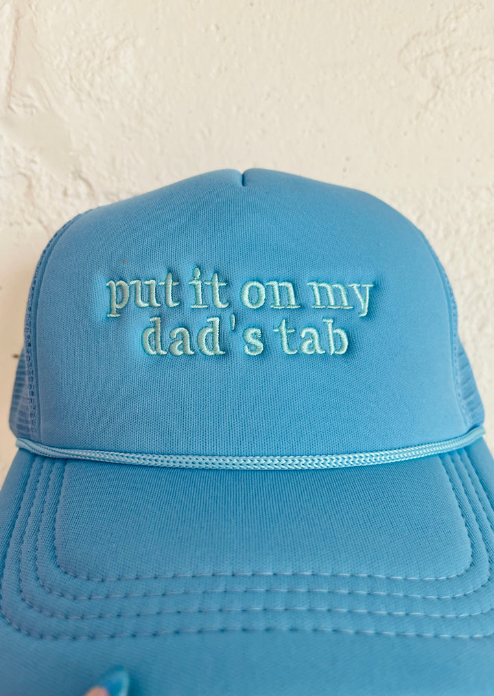 Put It On My Dad's Tab Trucker Hat