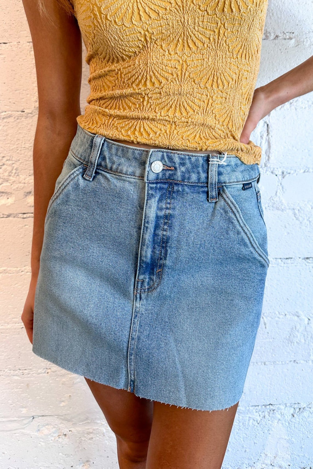 denim skirt, western-inspired skirt, trendy skirt, casual fashion, women's clothing, outfit ideas