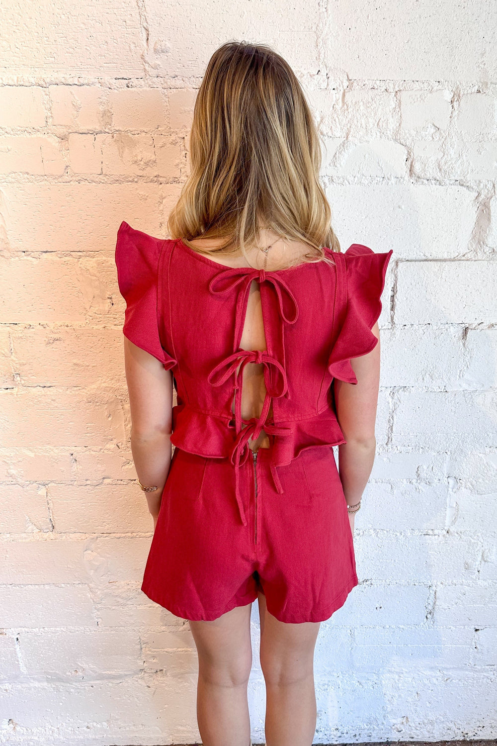 Red Endzone Romper, Romper, Dresses and Rompers, GameDay Outfit, Endzone Romper, Adeline Boutique, women’s fashion Dallas, trendy romper, casual outfits, stylish jumpsuit, summer fashion, versatile clothing, playful style, comfortable attire