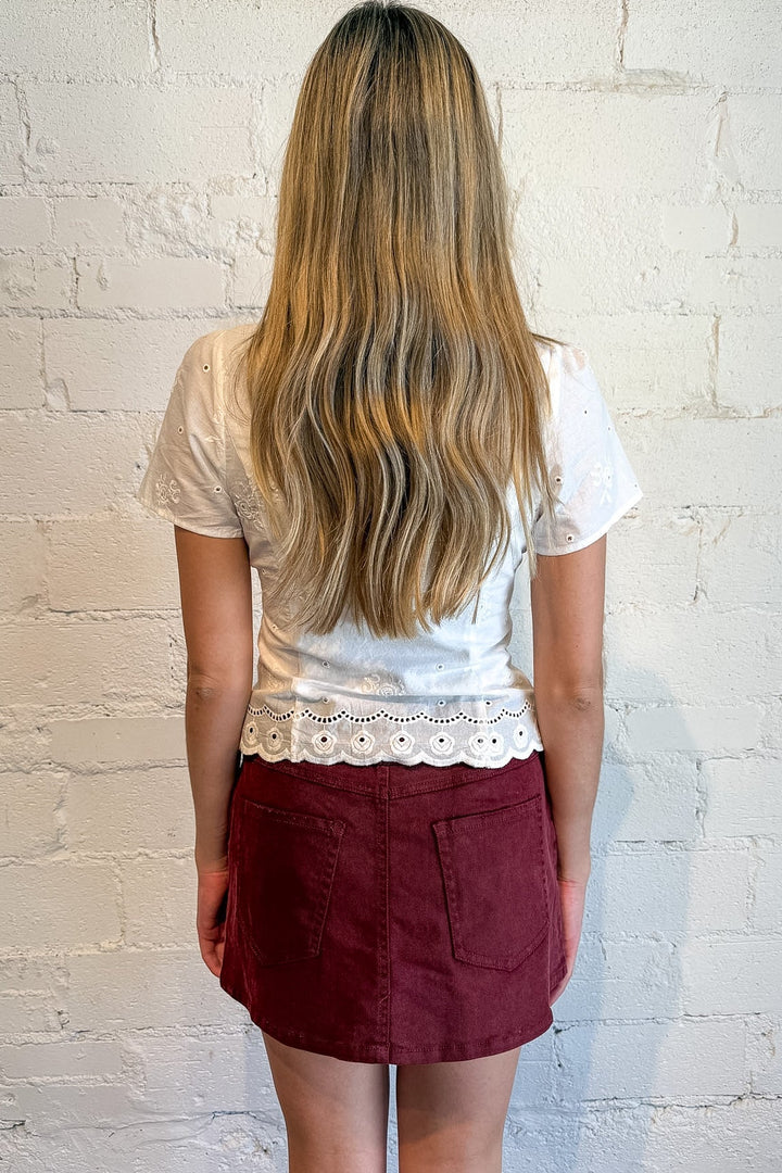 White denim mini skort with built-in shorts for women